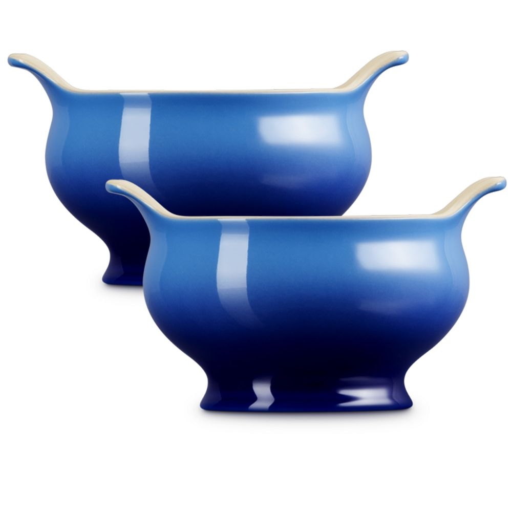 Two blue ceramic sauce boats with handles