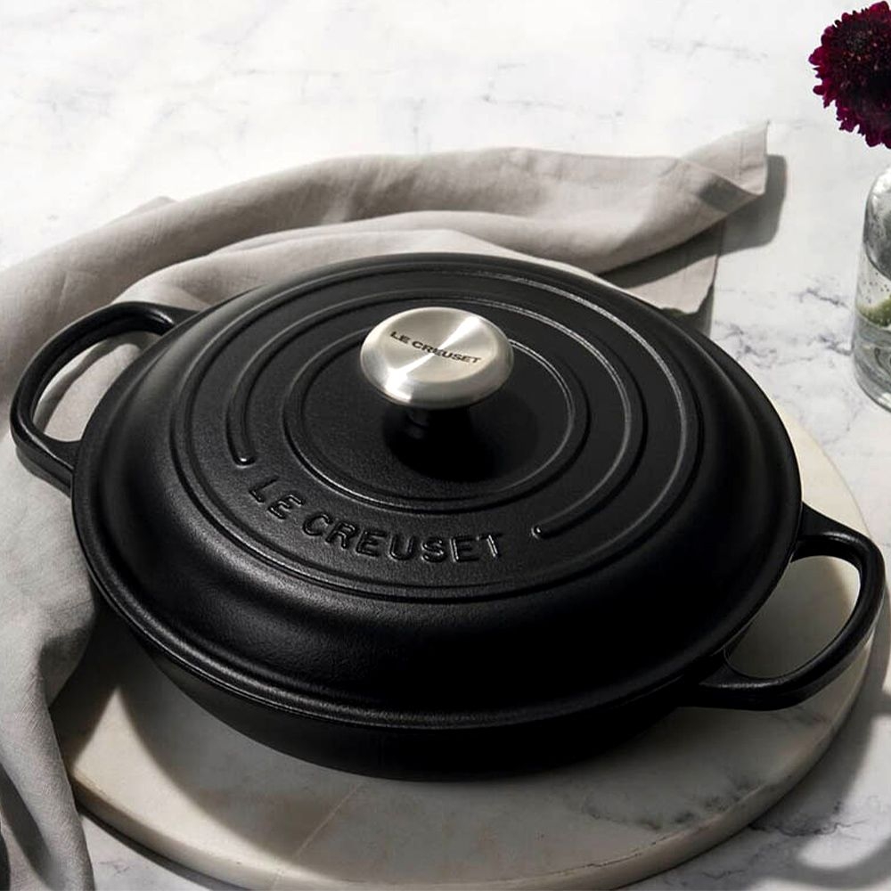 Black Le Creuset cast iron casserole with lid