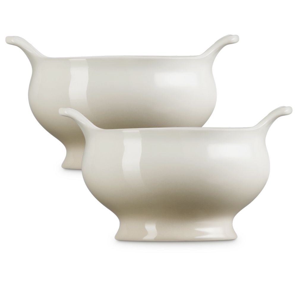 Zwei cremeweiße Porzellan-Saucieren im Set