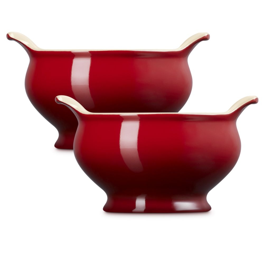 Two red ceramic sauce bowls with spouts