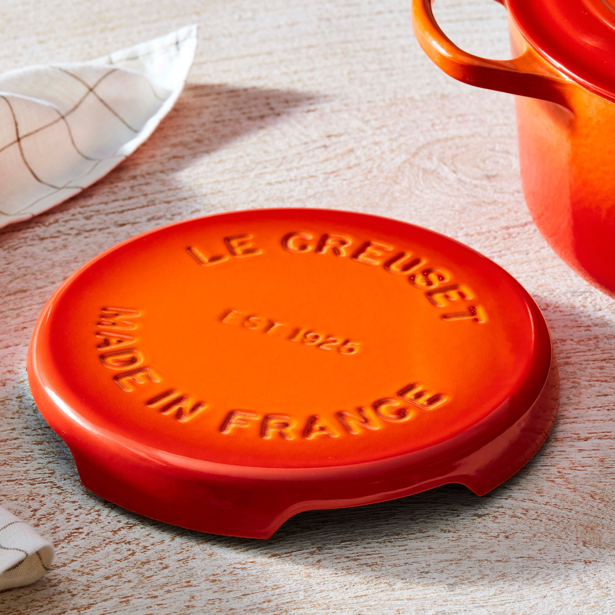 Le Creuset - Untersetzer Signature - 22 cm - Ofenrot