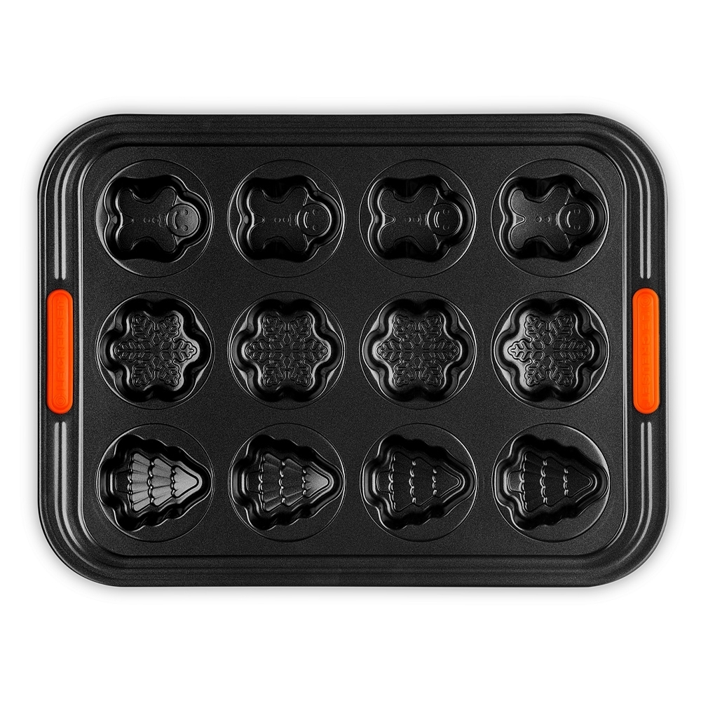 Le Creuset 12-cup Christmas tin with baked pastries